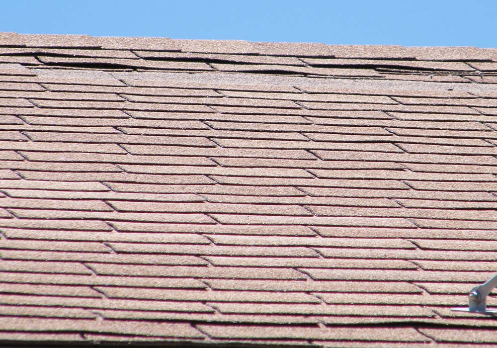 Loose Flapping Shingles