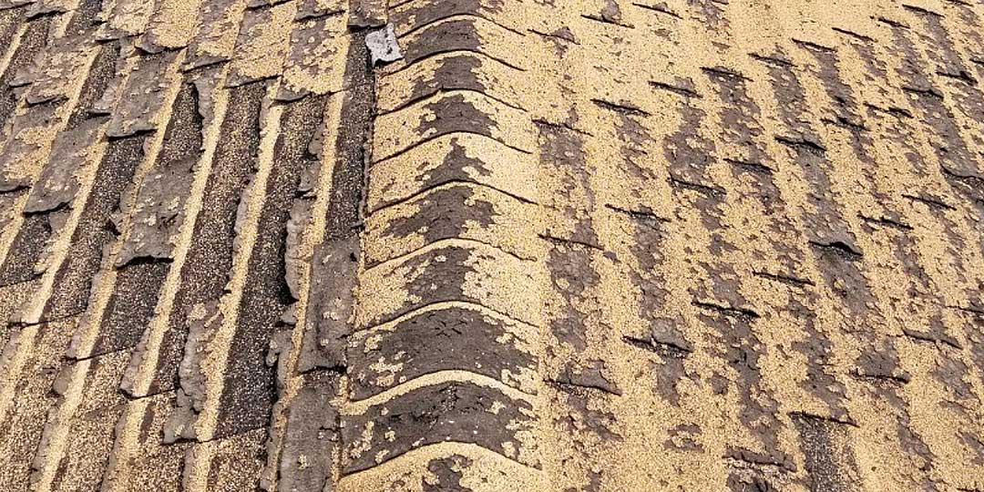 Close Up View of Curling Brittle Old Shingles