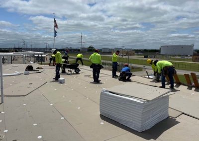 Installing TPO ISO Board Insulation After Storm Damage