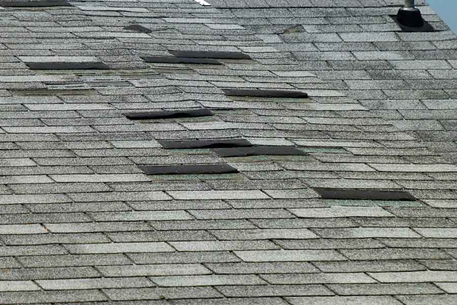 Multiple Missing Roof Shingles After Wind Damage