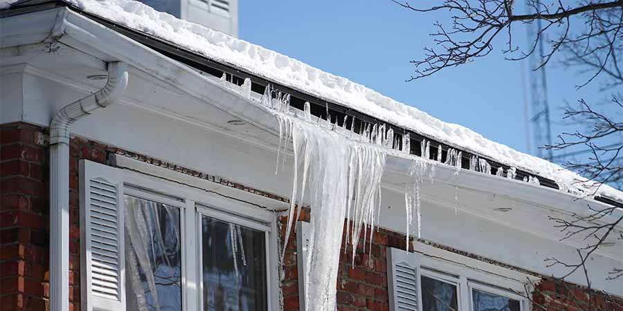 ice dam roof gutter damage