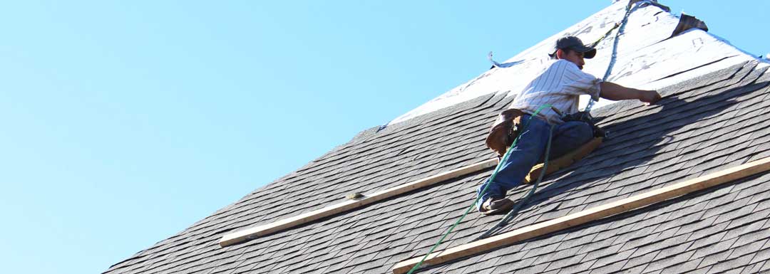 Roofer Installing Architectural Asphalt Shingles