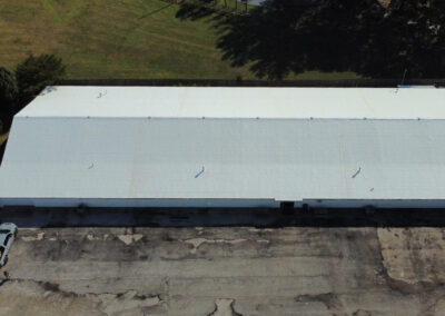 After Tulsa Metal To TPO Membrane Roofing Retrofit