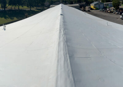 After Tulsa Metal To TPO Membrane Roofing Retrofit